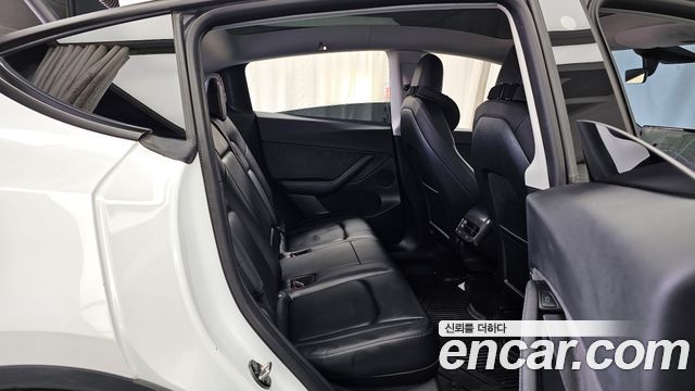 Tesla Model Y 2021 — photo 18