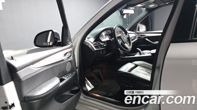 BMW X5 2014 — photo 13