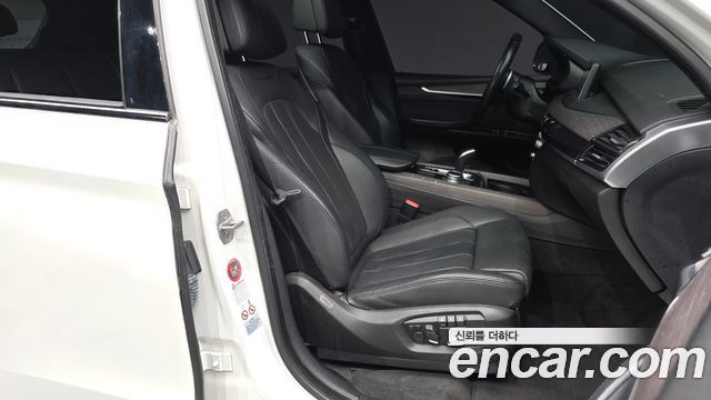 BMW X5 2014 — photo 17
