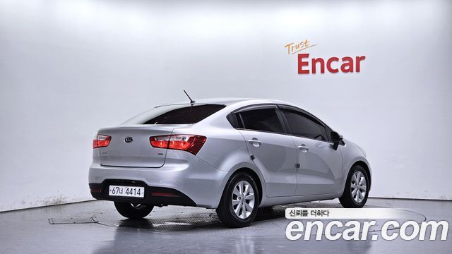 Kia pride 2012 — photo 2
