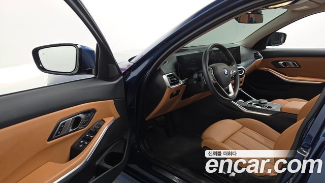 BMW 3-Series 2023 — photo 13
