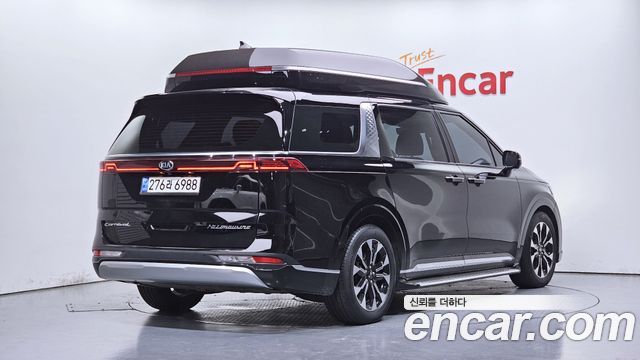 Kia Canival 2021 — photo 2