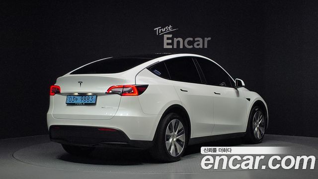 Tesla Model Y 2021 — photo 2