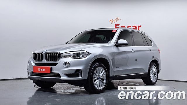 BMW X5 2014 — photo 1