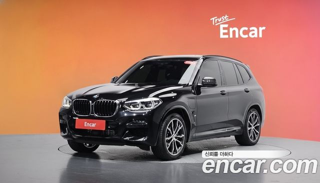 BMW X3 2021 — photo 1