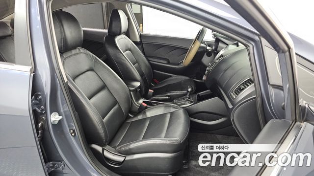 Kia K3 2014 — photo 11