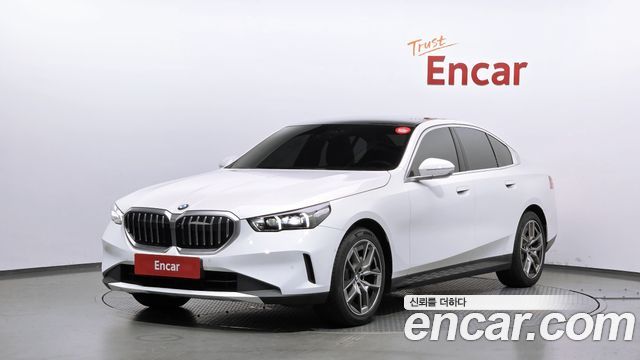 BMW 5-Series 2024 — photo 1