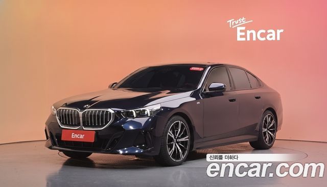 BMW 5-Series 2024 — photo 1