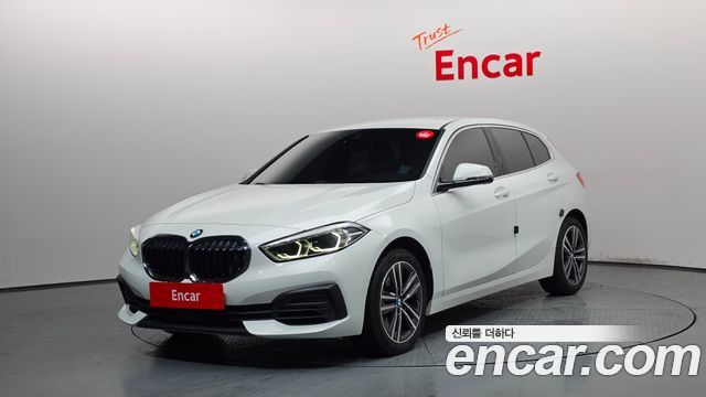 BMW 1-Series 2021 — photo 1