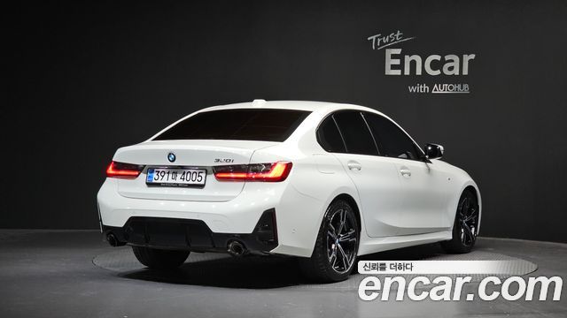 BMW 3-Series 2023 — photo 2