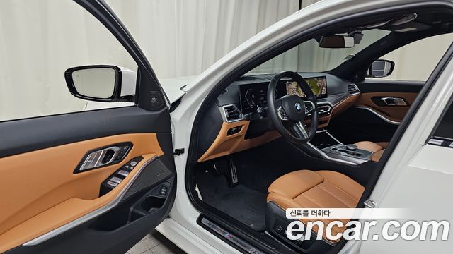 BMW 3-Series 2023 — photo 13