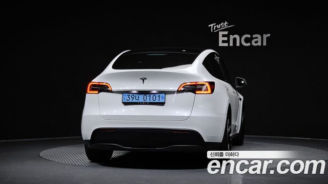 Tesla Model Y 2024 — photo 4