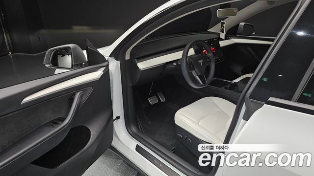 Tesla Model Y 2024 — photo 13