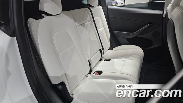 Tesla Model Y 2024 — photo 17