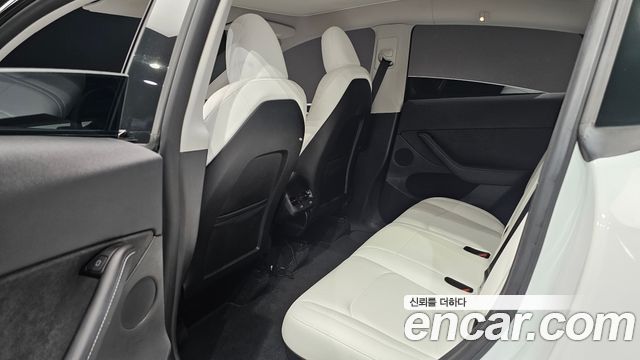 Tesla Model Y 2024 — photo 18