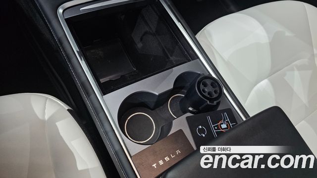 Tesla Model Y 2024 — photo 23