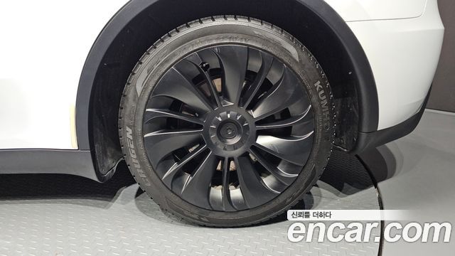 Tesla Model Y 2024 — photo 7