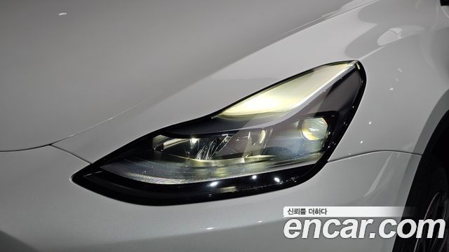 Tesla Model Y 2024 — photo 8
