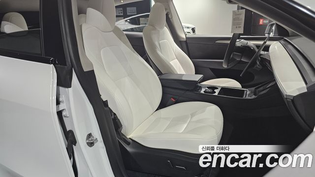 Tesla Model Y 2024 — photo 16