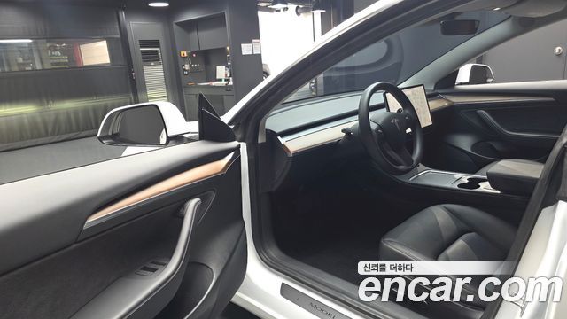 Tesla Model 3 2021 — photo 13