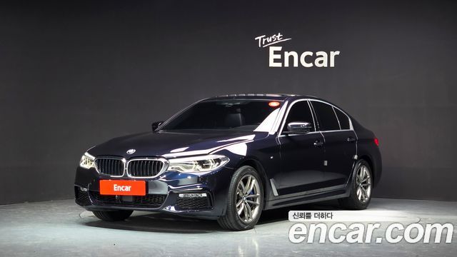 BMW 5-Series 2018 — photo 1
