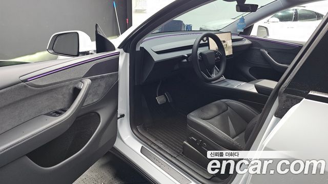 Tesla Model Y 2025 — photo 13