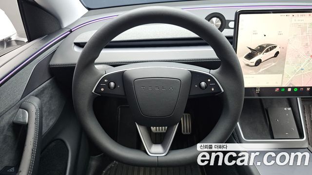 Tesla Model Y 2025 — photo 18