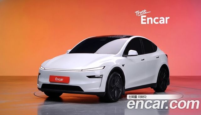 Tesla Model Y 2025 — photo 1
