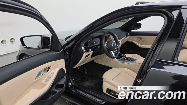 BMW 3-Series 2022 — photo 13