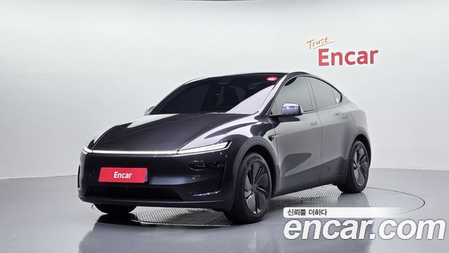 Tesla Model Y 2025 — photo 1