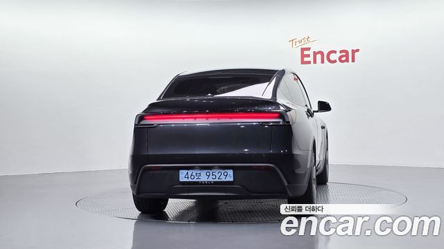 Tesla Model Y 2025 — photo 4
