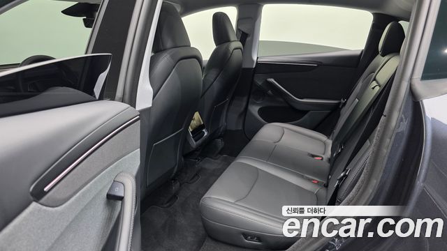 Tesla Model Y 2025 — photo 18