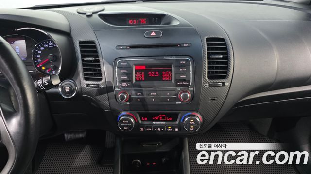 Kia K3 2013 — photo 14