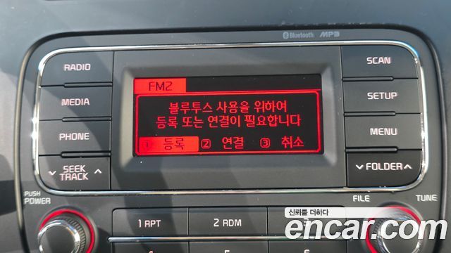 Kia K3 2013 — photo 15