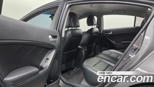 Kia K3 2013 — photo 18