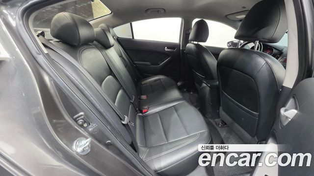 Kia K3 2013 — photo 19