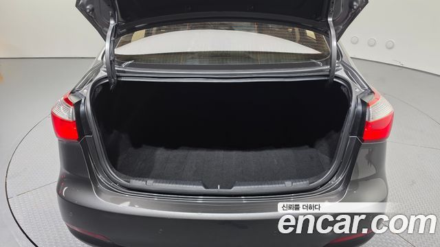Kia K3 2013 — photo 20