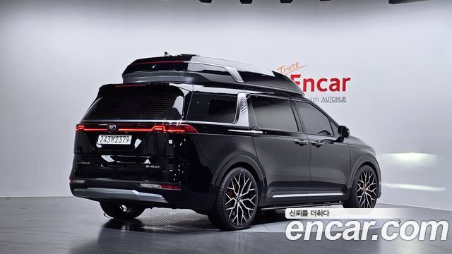 Kia Canival 2021 — photo 2