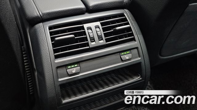BMW 5-Series 2014 — photo 16