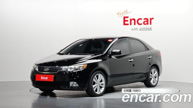 Kia Porte 2011 — photo 1