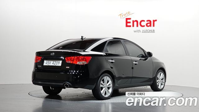 Kia Porte 2011 — photo 2