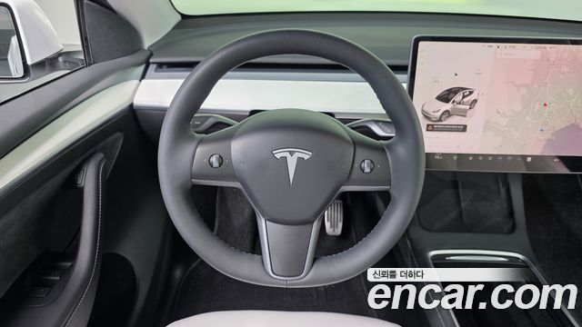 Tesla Model Y 2023 — photo 19