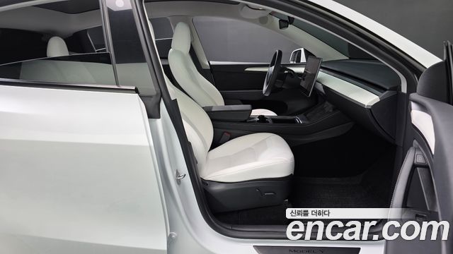 Tesla Model Y 2023 — photo 16
