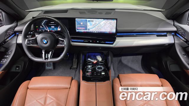 BMW 5-Series 2024 — photo 10