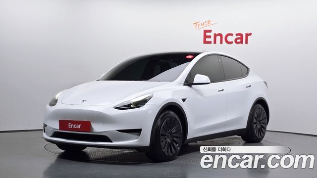 Tesla Model Y 2023 — photo 1