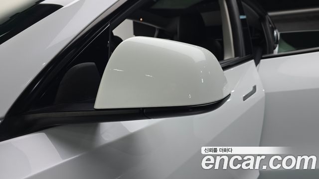 Tesla Model Y 2023 — photo 30