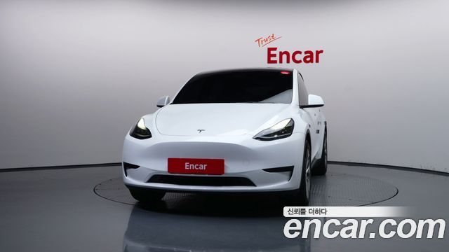 Tesla Model Y 2024 — photo 3