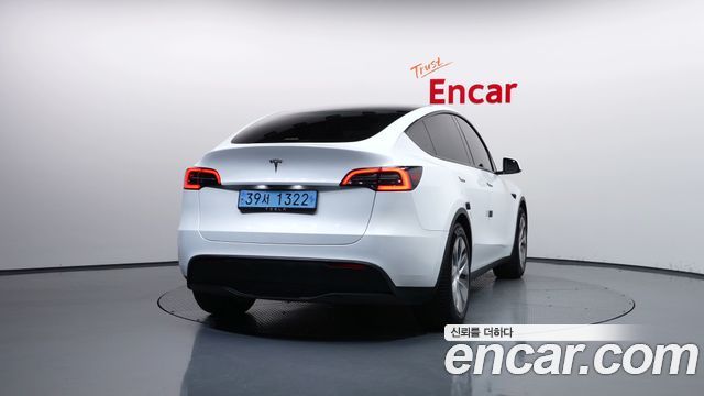 Tesla Model Y 2024 — photo 4