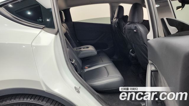 Tesla Model Y 2024 — photo 17