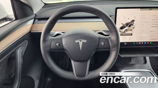 Tesla Model Y 2024 — photo 21
